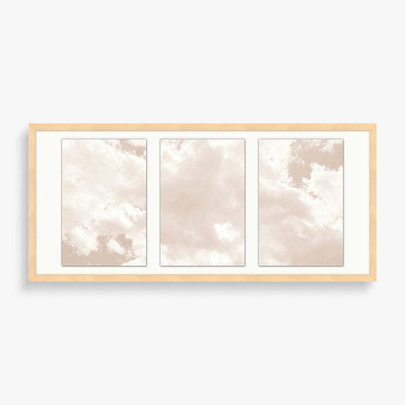 Large wall art photography featuring three cloud images overlayed with a pastel pink