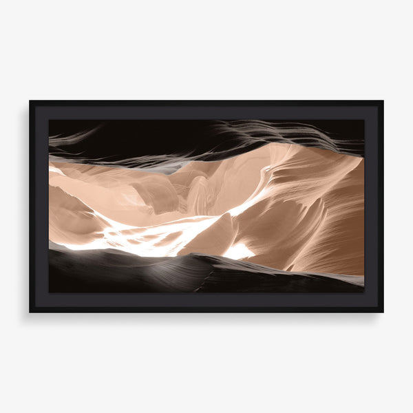 Large wall art featuring abstract and contrasting nature photography of canyon walls.