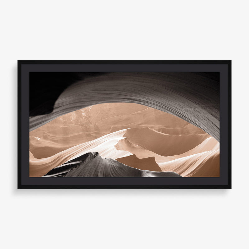 Large wall art featuring abstract and contrasting nature photography of canyon walls. 