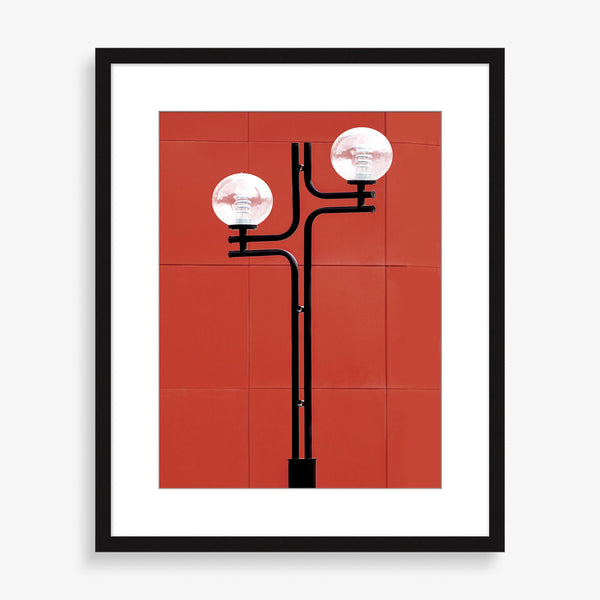Large wall art featuring retro painting of a street light with red. 