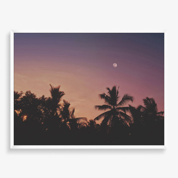 Large wall art piece featuring a sunset and palm trees with moon. 