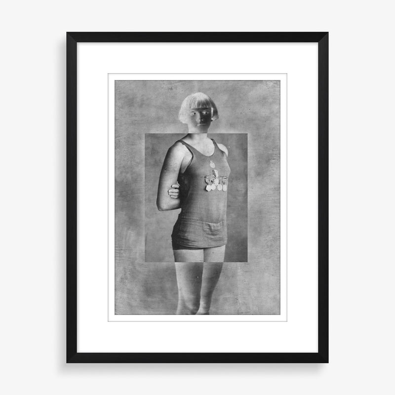 Large wall art piece featuring inverted black and white vintage photography. 