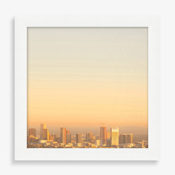 Large wall art featuring a progression photography series of sunset over Los Angeles.