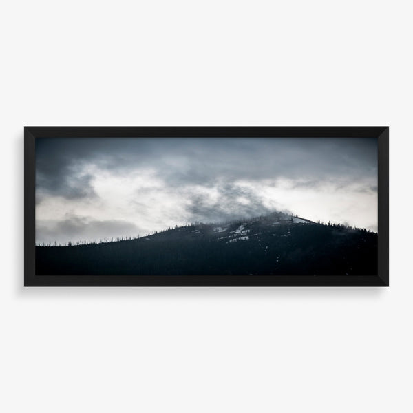 Large wall art featuring photography of a high contrast mountain range. 