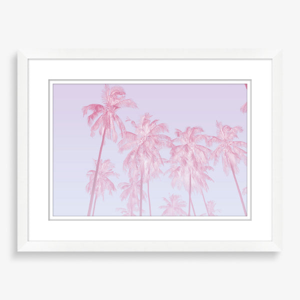 Large wall art featuring palm tree photography with bright pink overlay. 