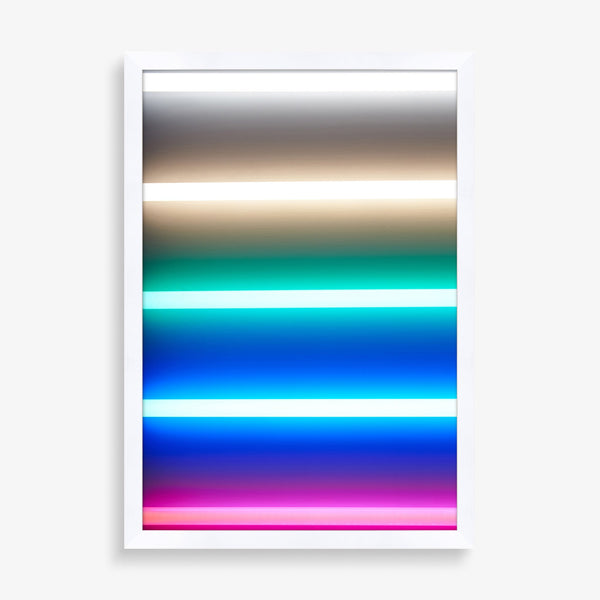 Large wall art piece of abstract neon rainbow panels.