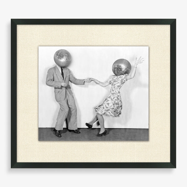 Large wall art featuring dancing couple and disco balls in black and white.