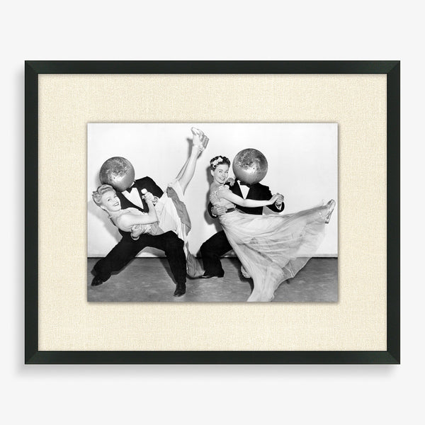 Large wall art featuring two dancing couples and disco balls in black and white.