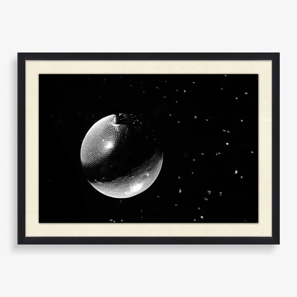 Large wall art with disco ball on black background in black and white