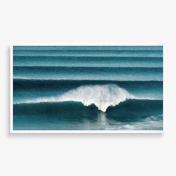 Large wall art piece featuring abstract photography of the ocean