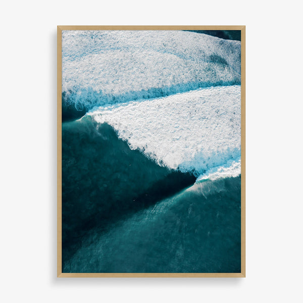 Large wall art piece featuring abstract photography of the ocean