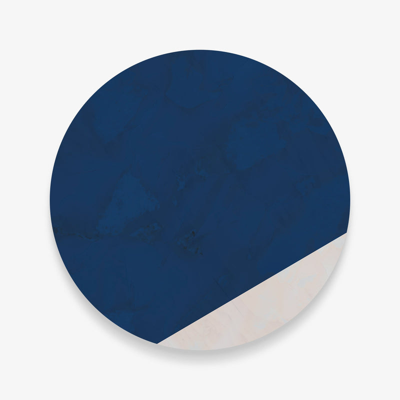 Large circular wall art featuring blue and neutral geometric design.