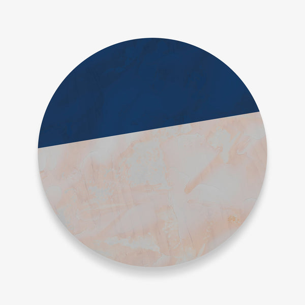 Large circular wall art featuring blue and neutral geometric design.